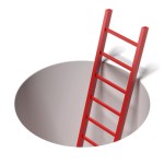 Ladder standing inside hole